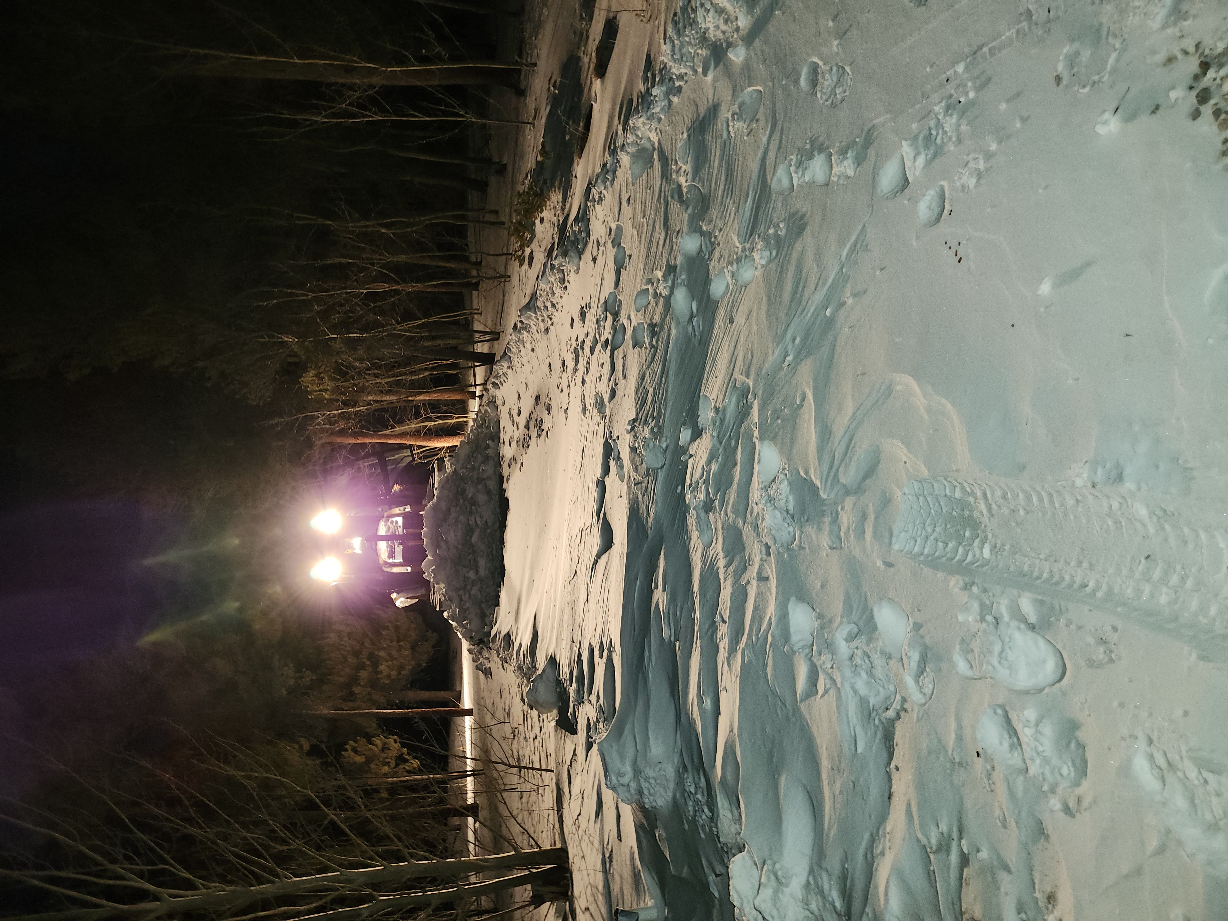 Our excavator plowing snow